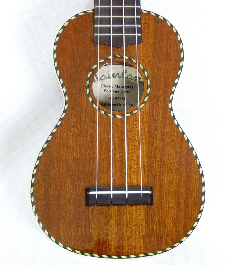 Celomasivní lesklé mahagonové sopranové ukulele Mainland